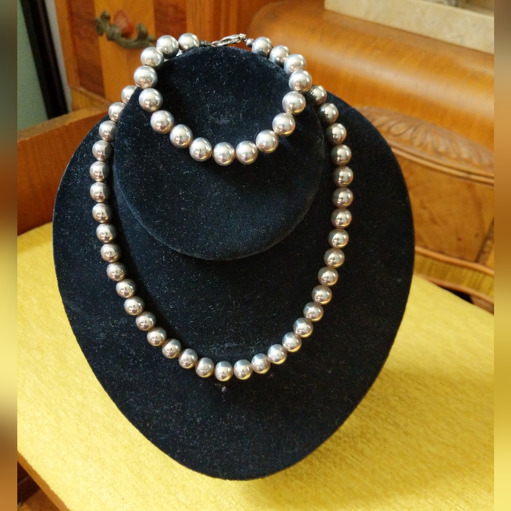 Silver beaded necklace and matching bracelet